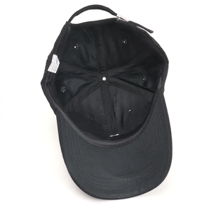 Internal view of black cotton baseball cap showing reinforced seams and sweatband details
