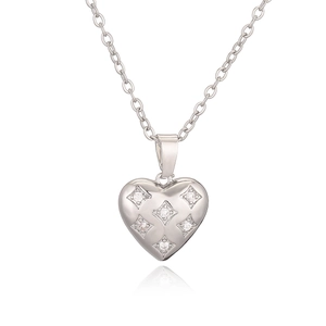 Minimalist silver heart pendant necklace with five cubic zirconia stones on O-chain link