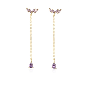Detail of 18K gold plated tassel earrings with purple marquise and pear-shaped zircons