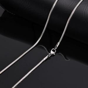Detail of silver stainless steel snake chain necklace with a secure lobster clasp closure
