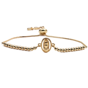 Minimalist gold Virgin Mary charm bracelet with beaded chain and adjustable slider clasp