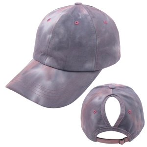 Detail of grey and pink tie-dye ponytail baseball cap featuring a back pony hole cutout