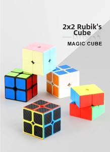 Collection of 2x2 speed cubes in macaron, solid colors, and carbon fiber texture finishes