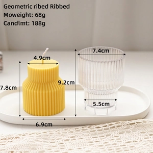 Stepped geometric candle mold with vertical stripes and yellow wax finished candle