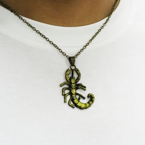 Vintage bronze scorpion pendant necklace for men with O-chain on white T-shirt model