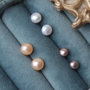 Elegant natural freshwater pearl stud earrings on blue velvet tray with S925 silver needles