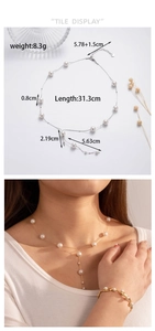 Detail view of gold pearl Y-necklace with dimensions and model wearing a drop pendant