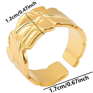Macro view showing 1.2cm width and 1.7cm diameter of gold floral relief open ring