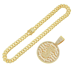 Hip hop gold Cuban chain necklace featuring a round iced-out dollar sign pendant detail