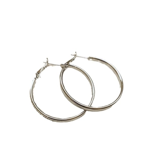 Minimalist silver hoop earrings with a polished metallic finish and pin closure