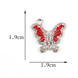 Sparkling silver butterfly charm with red enamel and rhinestones for DIY jewelry making