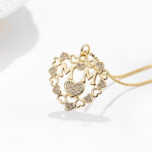 Golden MAMA heart pendant necklace with micro-paved crystals on a thin box chain for women