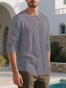 Detail of grey cotton linen shirt featuring mandarin collar and pleated placket design