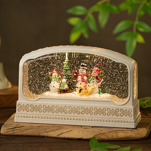 Christmas snowman family snow globe music box with tree and vintage embossed base