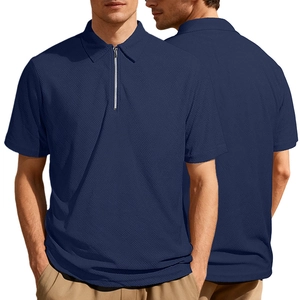 Close-up of navy blue men's zip polo shirt featuring textured waffle knit fabric details