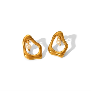Detailed macro view of geometric gold earrings with small hanging pearl drop accents