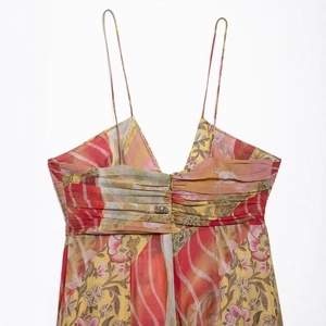 Floral print midi dress for women featuring yellow base and elegant pleated neckline