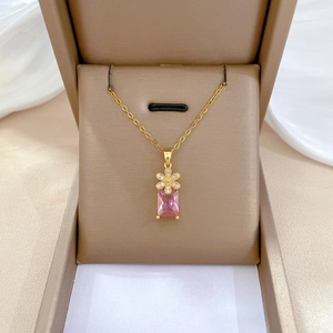Titanium steel necklace with rectangle pink gemstone and floral pavé detail in a gift box