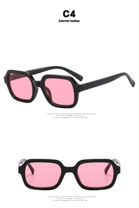Eckige schwarze Sonnenbrille mit rosa Gläsern in Seiten- und Frontansicht im Detail