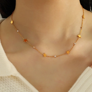 Minimalist gold titanium necklace with star charms and sparkling zircon inlays for women