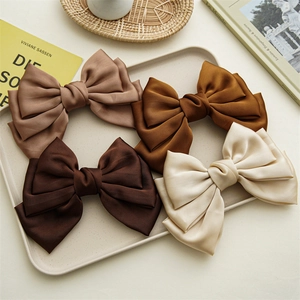 Set of four satin triple-layer bow hair clips in cream, tan, brown and coffee colors