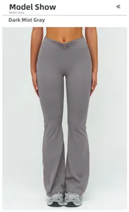Detail view of high waist yoga flare pants featuring a V-shaped gathered waistband design