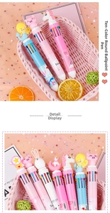 Detailed view of ten-color ballpoint pens with various cute cartoon character toppers