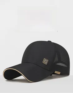 Detail of black breathable mesh baseball cap with metal plaque and side sport tag