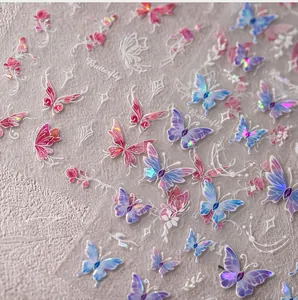 Detail of 3D embossed butterfly nail stickers with iridescent laser and glitter effects