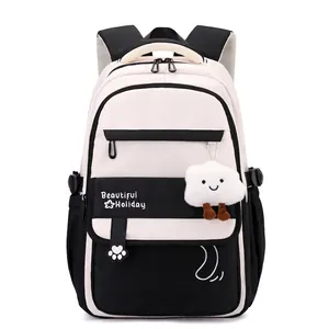 Lightweight black and white school backpack for girls with cute floral print and pendant