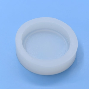 Round silicone mold for DIY baking and crafts shown on a clean blue background