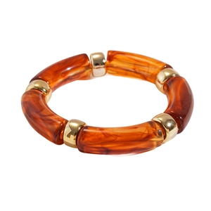 Vintage acrylic amber leopard print tube bracelet with gold beads on white background