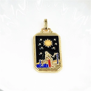Detailed close-up of a gold-plated tarot star pendant with colorful enamel inlay art
