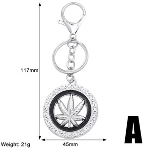 Detailed view of silver maple leaf keychain with rhinestones showing dimensions 117mm by 45mm