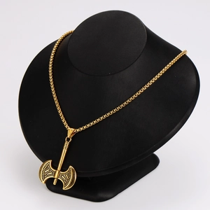 Golden double-bladed battle axe pendant with box chain on a black jewelry neck display