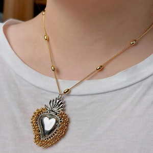 Sacred Heart pendant necklace in 18k gold bead chain with two-tone silver heart charm