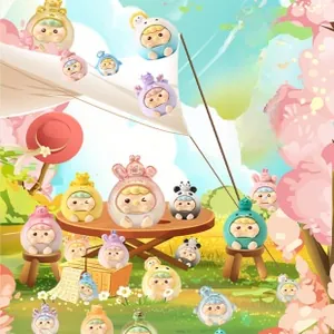 Macro detail of various cute mini doll figures in colorful themed animal headgear