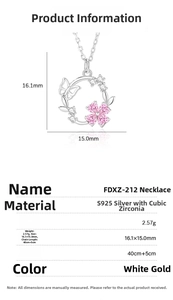 Macro shot of S925 silver flower and butterfly pendant with pink heart cubic zirconia