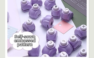 Flat lay of colorful craft hole punchers with various alphabet and number patterns