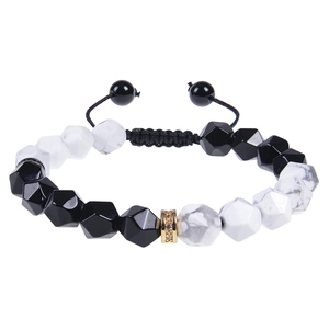 Detail of 10mm faceted black onyx and turquoise beaded bracelet with gold spacers
