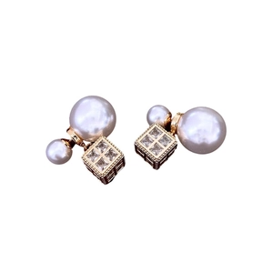 Elegant gold earrings with double white pearls and cubic zirconia geometric accents