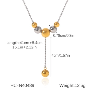 Detailed size chart of two-tone bead tassel necklace in gold and silver stainless steel