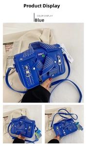 Detail of blue motorcycle jacket bag with silver rivets and metallic zippers