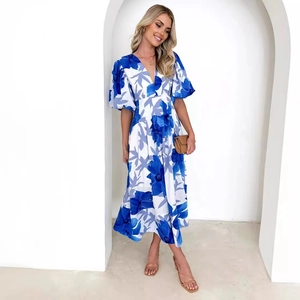 Floral A-line midi dress with puff sleeves and V-neckline in blue and white print