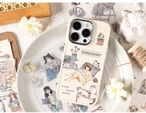 Detailed view of off-white iPhone case featuring girl and cat illustrations in cozy style