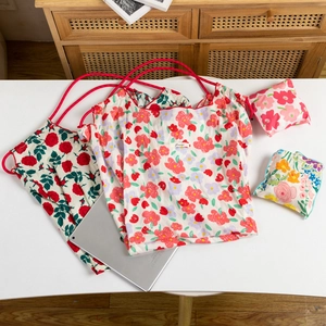 Foldable large capacity tote bags set featuring red and pink floral patterns with red handles