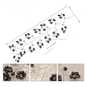 Detail view of 27cm black acrylic crystal hair vine with size and 29g weight specifications