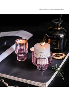 Detail view of pink vertical-ribbed glass candle holder with dual-use design for dining table