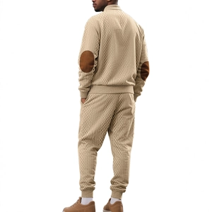 Men's beige knit tracksuit set with textured diamond pattern and elbow patches