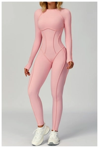 Detailed view of pink long sleeve yoga jumpsuit with body-contouring stitching and high elasticity